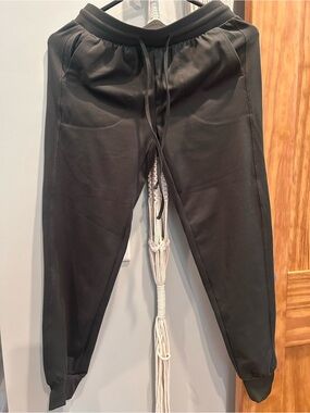 Rachel Zoe cuffed dark olive green pants